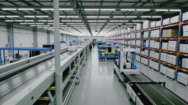Modern automated warehouse facility logistics system AI video preview