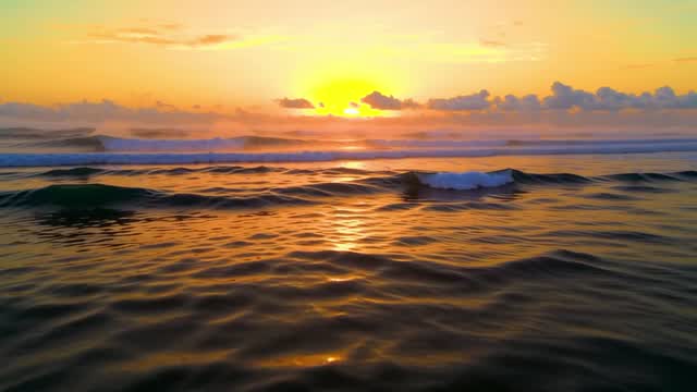 Golden hour sunset over the ocean waves at the beach AI video preview