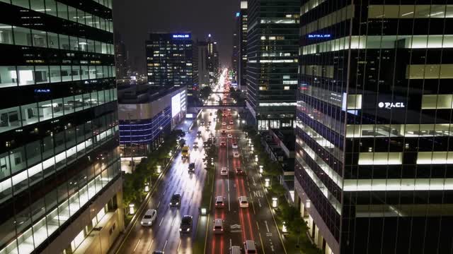 Busy nighttime cityscape traffic passing between modern towers AI video preview