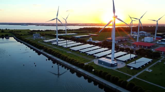 Renewable energy facility with wind turbines and solar arrays AI video preview