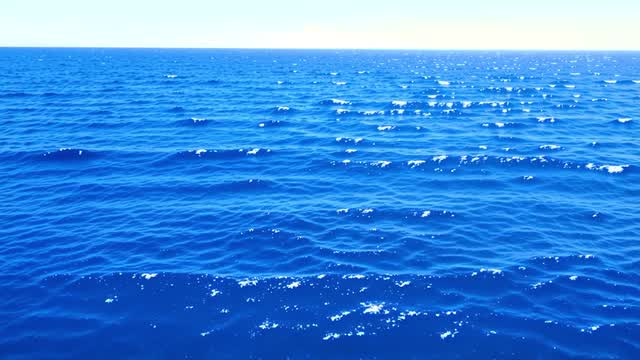 Blue open ocean surface with gentle waves AI video preview